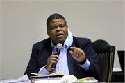 Deputy Minister Mr David Mahlobo asking question in a discussion session 08